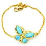 A 925 silver gilt butterfly shaped bracelet set with cabochon cut larimar, L. 17cm.