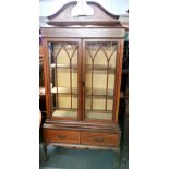 An inlaid mahogany display cabinet with two bottom drawers, 195 x 100 x 35cm.