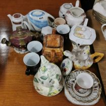 A group of teacups and other items.