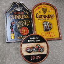Three reproduction wooden advertising signs, tallest 61cm.