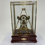 A large contemporary brass grasshopper clock in glass case, H. 55cm, W. 37cm.