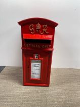 A heavy cast metal reproduction post box, H. 58cm.