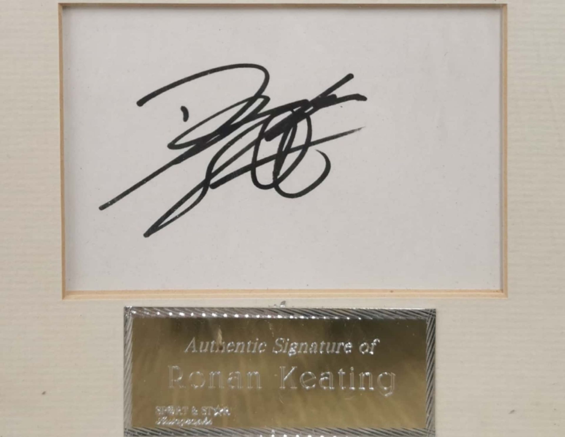 A framed photograph and autograph, signed by Ronan Keating with certificate of authenticity for - Image 2 of 4