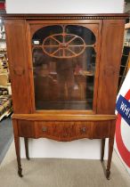 A glass fronted early 20thC carved single drawer walnut veneered display cabinet, 162 x 102 x 35cm.