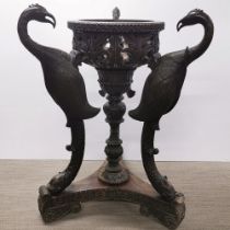 A superb 19thC carved hardwood planter holder, with repair to neck, H. 90cm bowl Dia. 40cm base W.