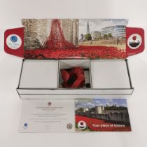 A boxed Paul Cummings Tower of London ceramic poppy.