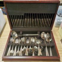 A cased bronze cutlery set.