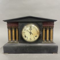 A 19th century classical wooden mantle clock. W. 41cm. H. 29cm.