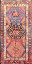 An antique hand woven Eastern rug, 128 x 295cm.