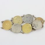 An unusual South African coin bracelet comprising four gold half pond coins ( dated 1894 ) and