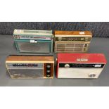 A group of four portable transistor radios including a Fidelity E8, Stella ST7005 / 00V, a Two-O-