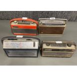 A group of four portable transistor radios including a Bush VTR.175 , two Roberts Ramblers and a