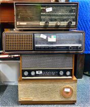 A Sharp transistor radio, model number FY-64E together with a Sky baron radio, Grundig RF420 and