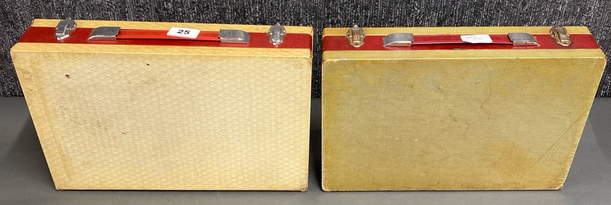 A set of two early Ever Ready cased transistor radios.