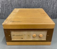 A Regentone handy-gram portable record player.