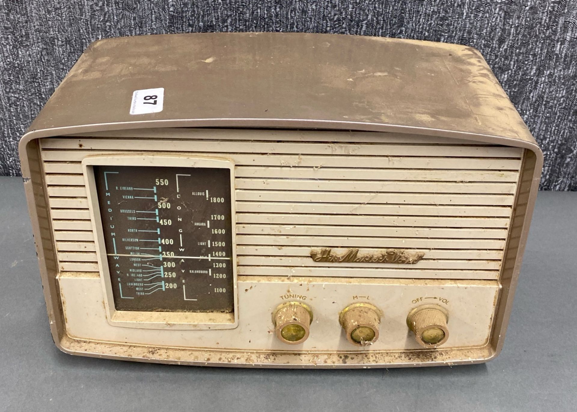 A His masters voice transistor radio, model number 1373.