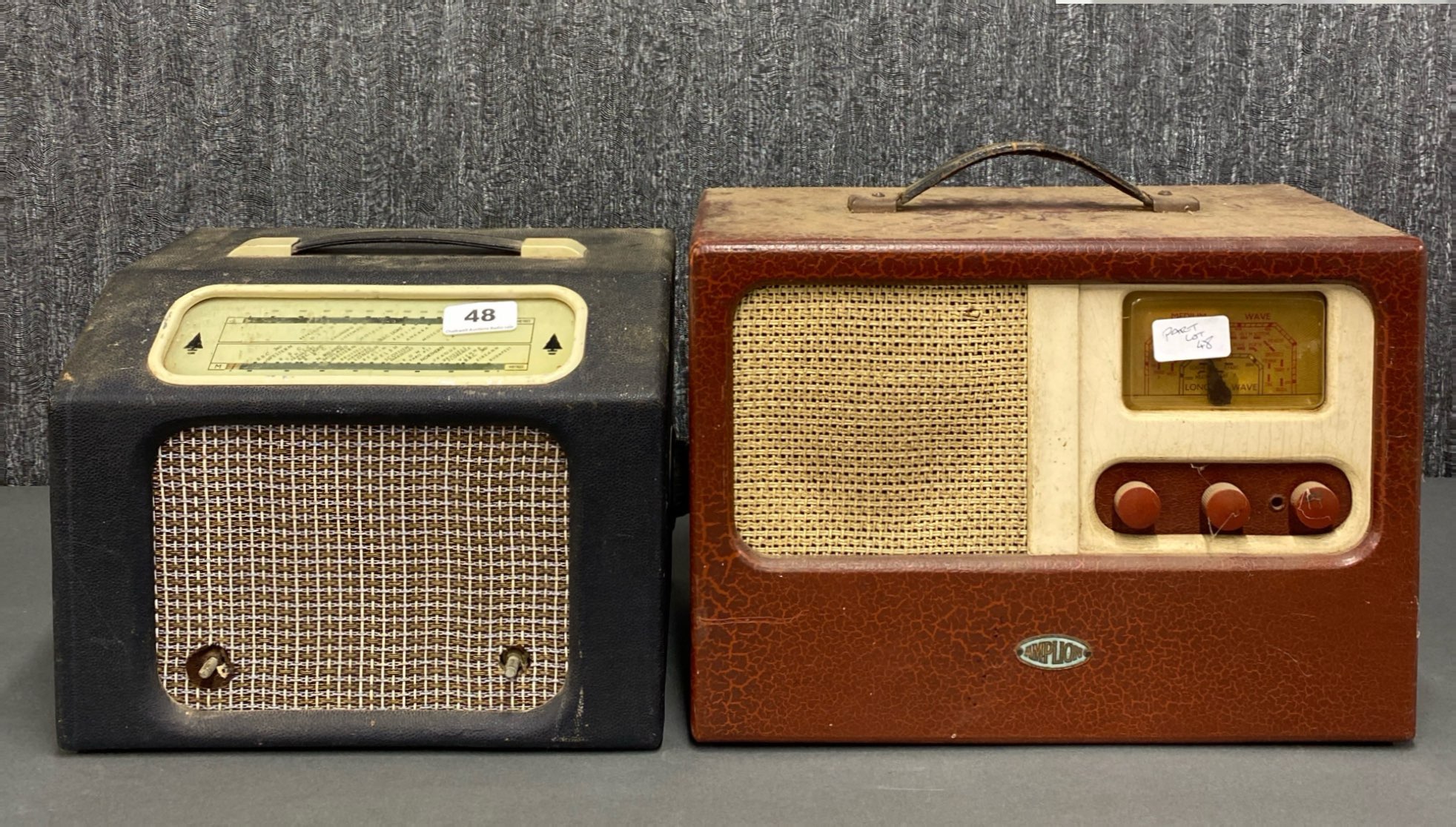 An early portable Bush radio together with a Amplion portable radio.