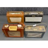 A group of four portable transistor radios including a Roberts R404 , Roberts R500, an Ever Ready