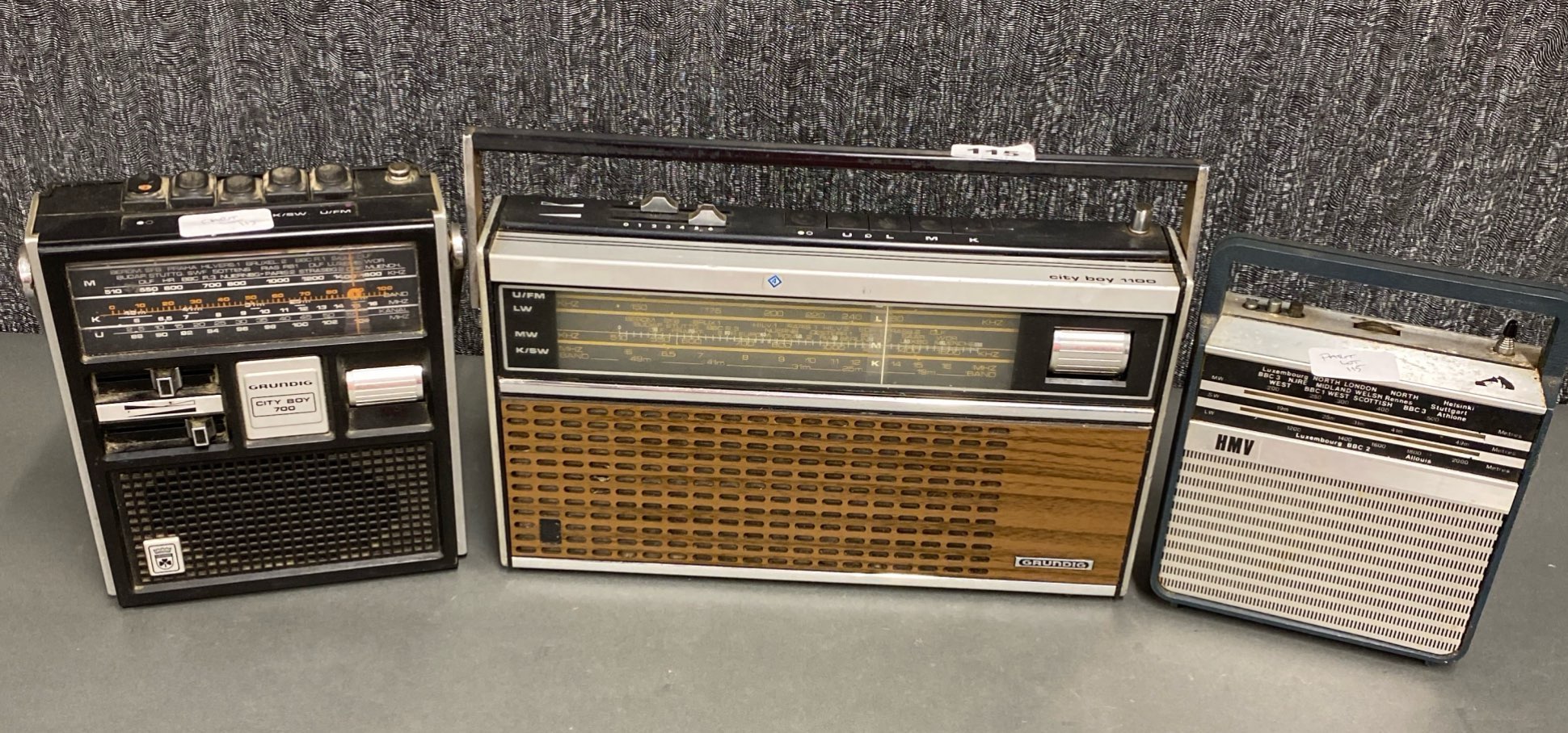 A Grundig Cityboy 1100 alongside a Grundig Cityboy 700 and a further HMV portable transistor radi