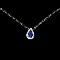 A matching 925 silver necklace set with a pear cut sapphire, L. 1.3cm.