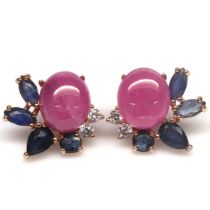 A pair of 925 silver earrings set with cabochon cut rubies and marquise cut sapphires, L. 1.7cm.