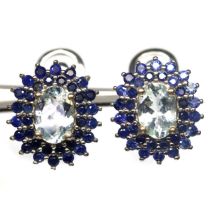 A pair of 925 silver cluster earrings set with oval cut blue topaz and two rows of sapphires, L. 1.4