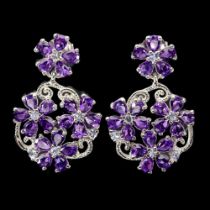 A pair of 925 silver drop earrings set with pear cut amethysts and white stones, L. 3.2cm.