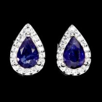 A pair of 925 silver earrings set with pear cut sapphires and white stones, L. 1cm.