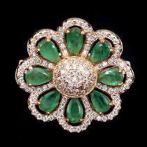 A rose gold on 925 silver cluster ring set with pear cut emeralds and white stones, dia. 2.1cm, ring