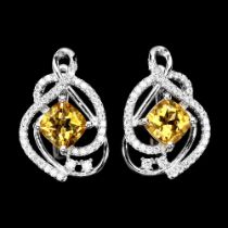 A pair of 925 silver earrings set with cushion cut citrines and white stones, L. 2cm.