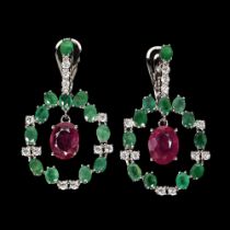 A pair of 925 silver drop earrings set with oval cut emeralds and rubies, L. 3.6cm.