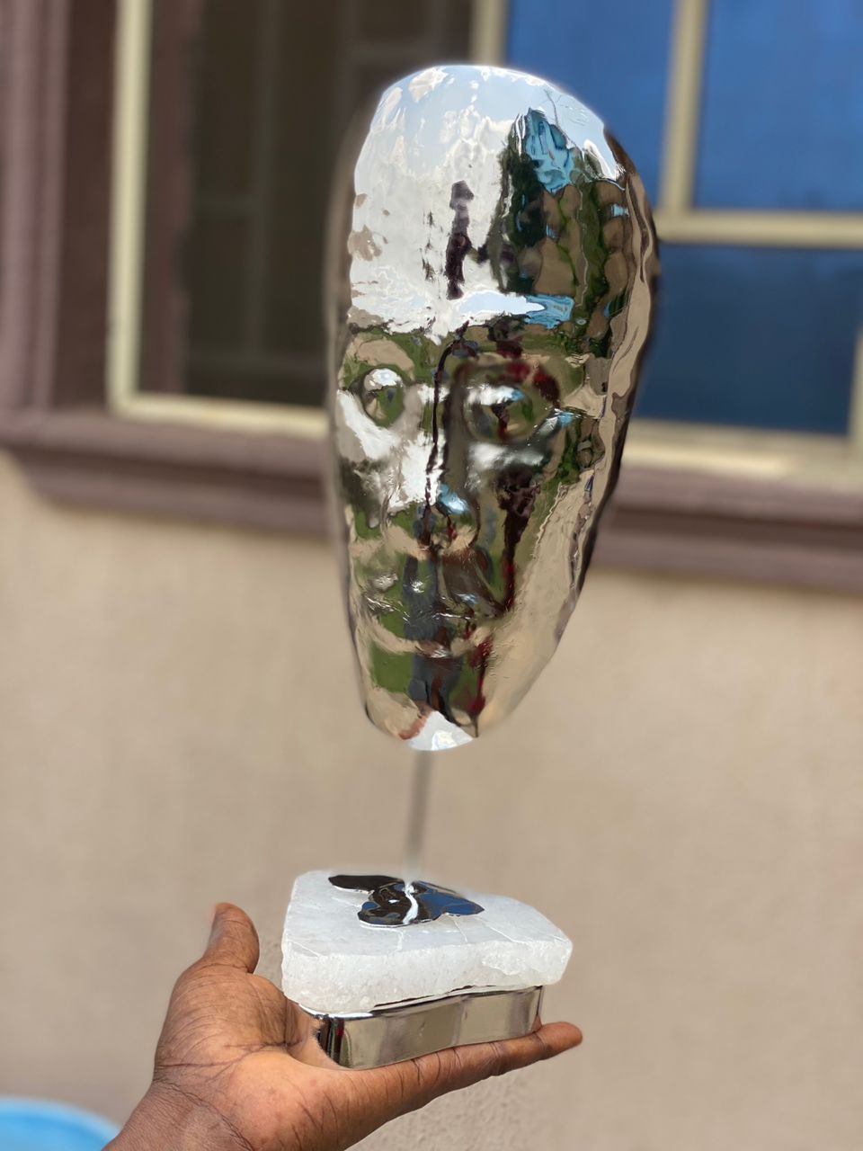 Little Reflection of an African Face by Kunle Fajemirokun Stainless steel and rock crystal base 2 - Image 2 of 3