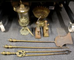 A 19thC hammered brass gothic style centrepiece with a brass porch light and a group of fireside