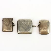 Three hallmarked silver vesta cases Largest. 4cm x 4.5cm.