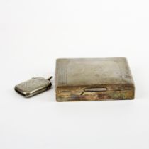 A hallmarked silver cigarette box and vesta case S. 10.5cm x8.5cm x 2.5cm