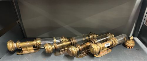 A group of four reproduction brass railway carriage lamps, H. 35cm.
