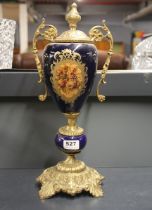 A porcelain and gilt metal mounted urn, H. 45cm.