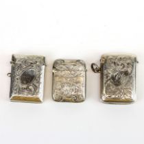 Three hallmarked silver vesta cases Largest. 4.5cm.