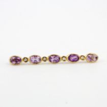 A hallmarked 9ct yellow gold amethyst and diamond brooch, L. 4.5cm.