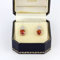 A pair of 9ct yellow gold earrings set with cushion cut sunrise mystic topaz and diamonds, L. 1.