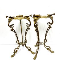 A pair of mid 20thC brass plant stands H. 56cm.