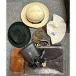 A hat box and contents with a vintage leather briefcase, binoculars and a travelling case,