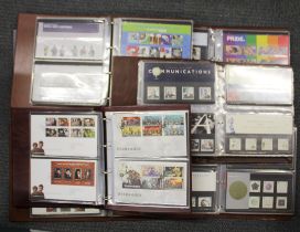 Seven albums of Royal Mail first day covers and presentation packs.
