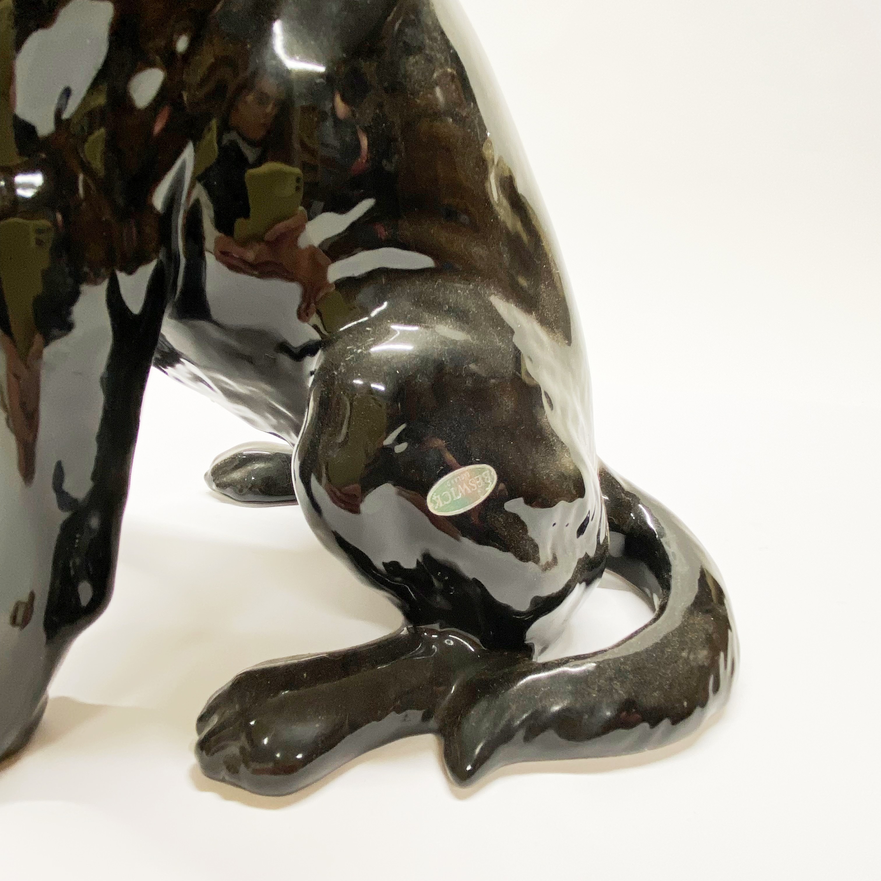 A large Beswick figure of a black labrador H. 34cm. - Image 2 of 3