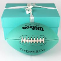 A boxed Tiffany American football.