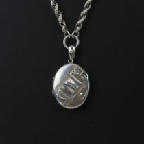 A silver buckle locket with a silver chain, locket size. 4cm.