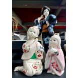 A group of three Japanese bisque porcelain figures, tallest H. 38cm. (Repaired to the back of the