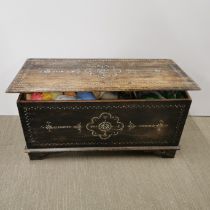 A mother of pearl inlaid wooden trunk containing a large quantity knitting yarn, 78 x 38 x 40cm.