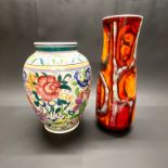 A large Poole pottery vase with orange poole pottery vase H. 40cm( A/F ) H. 34cm.