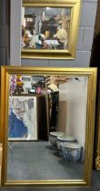 Two gilt framed mirrors, largest 91cm x 117cm.